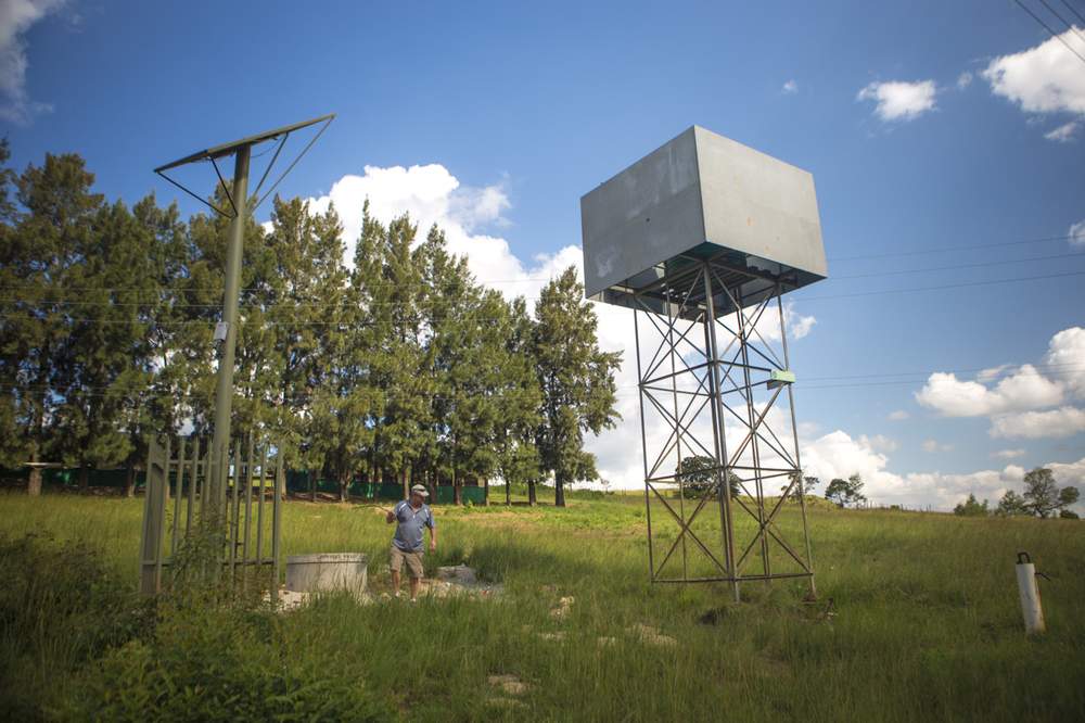 A disused storage tank for the PlayPump next to the new solar installation